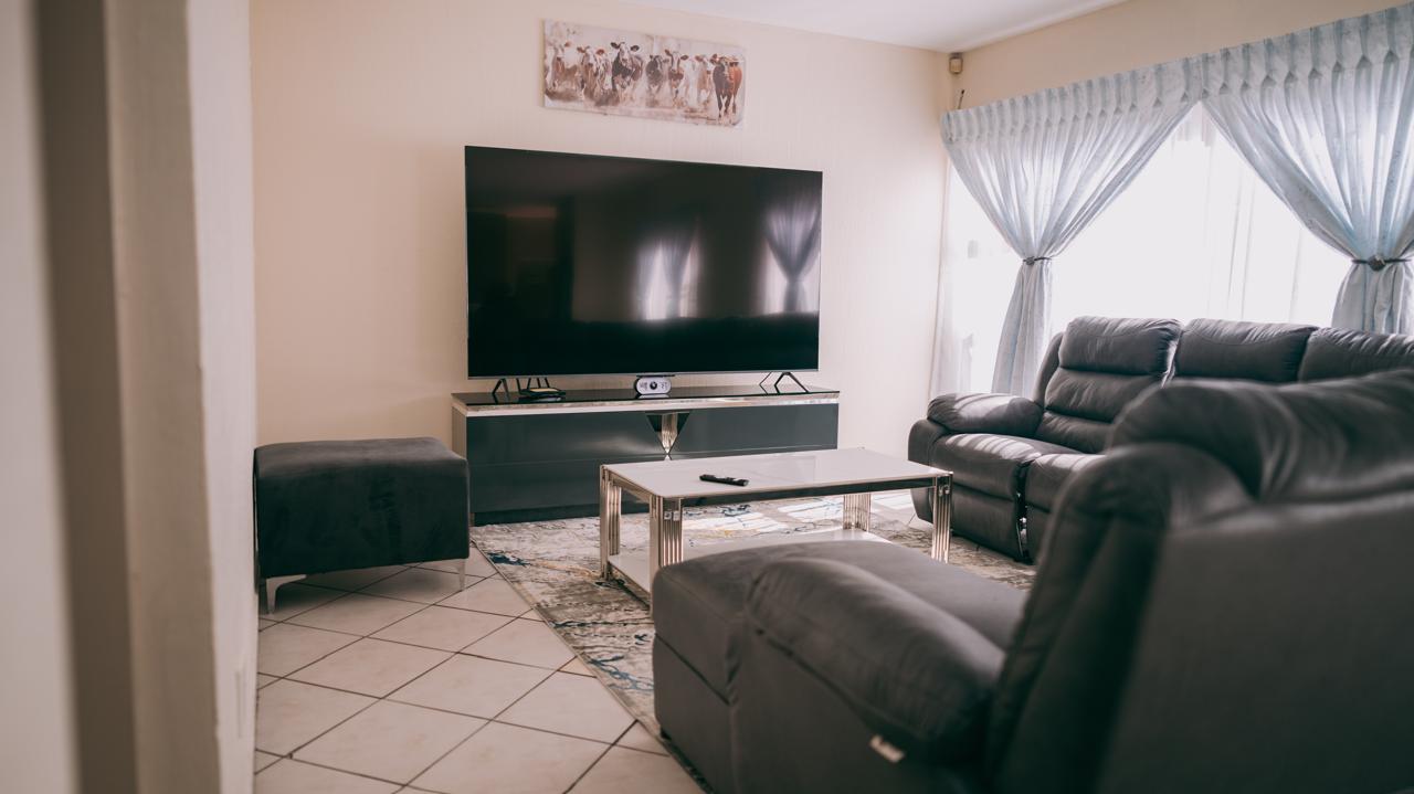 Le Voila lounge with leather recliners and large flat-screen TV